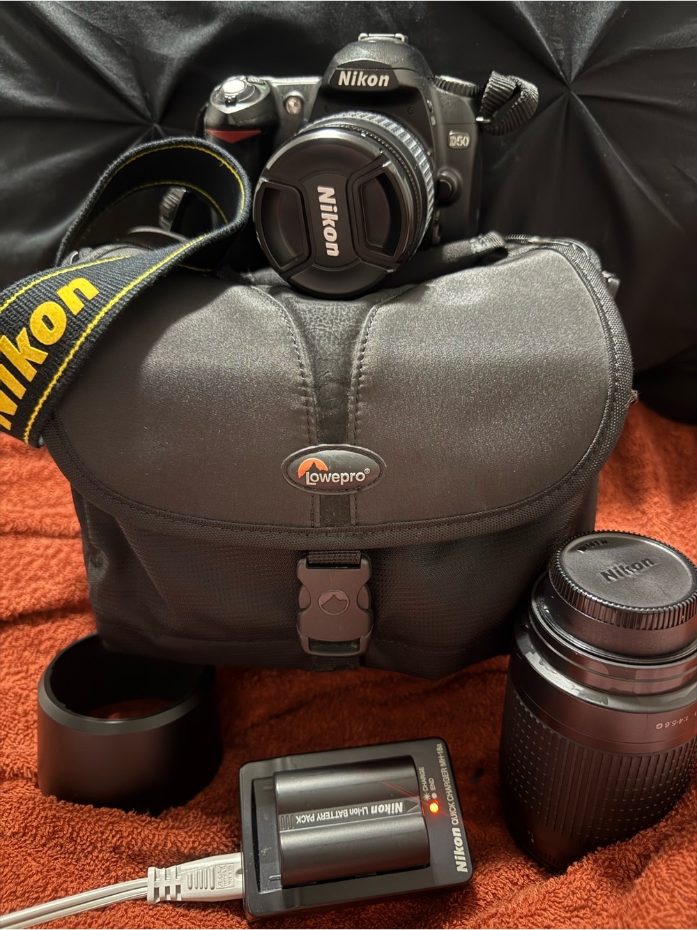 Nikon DSLR Camera Kit with Black Lowepro Bag and Yellow-Accented Strap